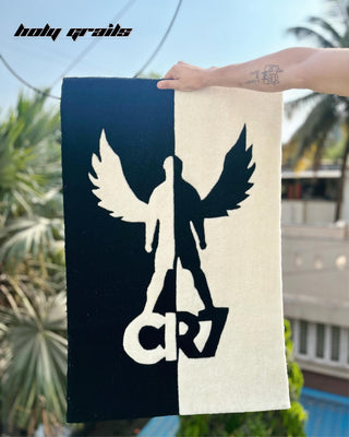 CR7 Ascend Tufted Rug hanging in Hand