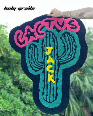 Cactus Vibe Tufted Rug Hanging in Hand