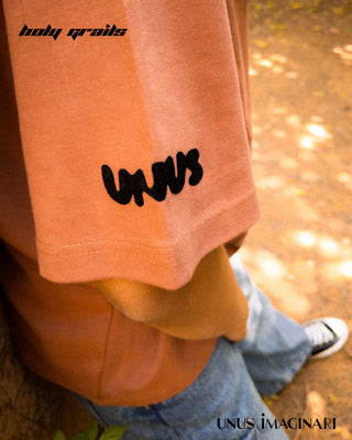 Guy In Streetwear Style 'Tawny Brown' 210 GSM 100% Cotton Oversize Graphic Tee HG x Unus Imaginari - Side Sleeve Print Close