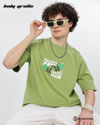 Guy in Street Style 'Nature Lost' Green 240 GSM 100% Terry Cotton Screen Printed Oversize Graphic Tee HG x Bumchiq - Front Sitting