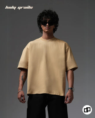 Guy in Streetwear Style 'Not So Basic' Beige 240 GSM 100% Cotton Embroidered Oversize T-Shirt HG x Grey Hound - Front