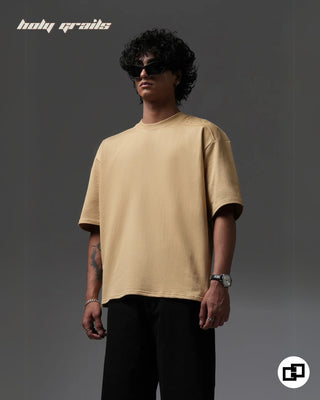 Guy in Streetwear Style 'Not So Basic' Beige 240 GSM 100% Cotton Embroidered Oversize T-Shirt HG x Grey Hound - Front Side