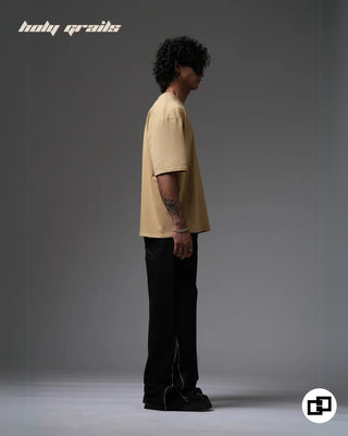 Guy in Streetwear Style 'Not So Basic' Beige 240 GSM 100% Cotton Embroidered Oversize T-Shirt HG x Grey Hound - Side 2 Full