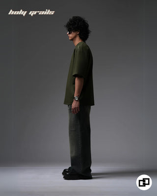 Guy in Streetwear Style 'Not So Basic' Military Green 240 GSM 100% Cotton Embroidered Oversize T-Shirt HG x Grey Hound - Side Full