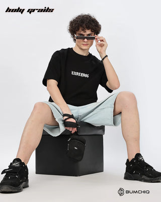 Guy in Street Style 'Underdog' Black 240 GSM 100% Terry Cotton Screen Printed Oversize Graphic Tee HG x Bumchiq - Front Sitting