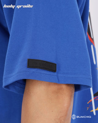 Guy in Streetwear Style 'Solo Bitch' Blue 240 GSM 100% Terry Cotton Oversize Graphic T-Shirt HG x Bumchiq - Sleeve Close Up