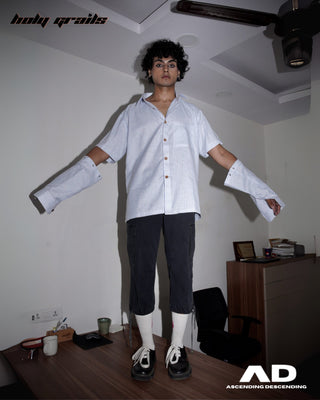 Men wearing a Street Style 'Switch' Blue & White Stripes Cotton Convertible Shirt and dark pants with long sleeves in an indoor setting standing on a Desk - Front