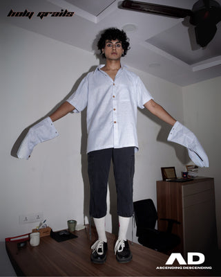 Men wearing a Street Style 'Switch' Blue & White Stripes Cotton Convertible Shirt and dark pants with sleeves in an indoor setting standing on a Desk - Front