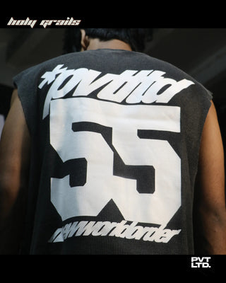 Men wearing a street style 'New World Order 55' Grey Waffle Knit Printed Sleeveless Vest HG x Pvt Ltd - Back Print Close