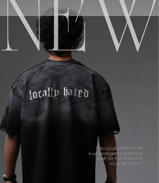 Person wearing a black t-shirt with 'locally hated' text on the back, against a gray background with large 'NEW' text.