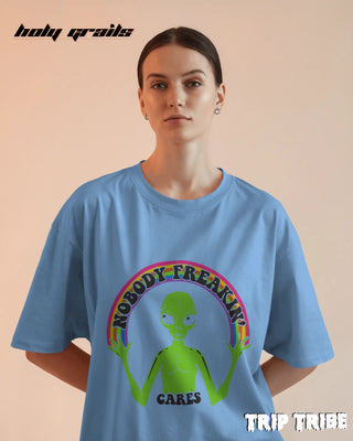 Women in Street Style '👽 Nobody Freakin’ Cares' Baby Blue 240 GSM 100% Cotton Oversize Tee HG x Trip Tribe - Front