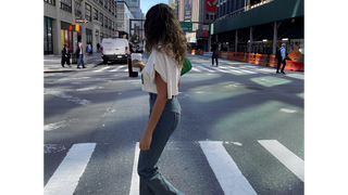 Featured Image - Girl in Denim Jeans crossing road - Streetwear India: Why Baggy Jeans & Cargo Pants Rule in 2026