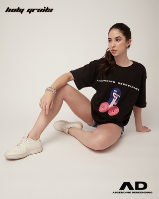 Girl in Streetwear Style 'Not Your Regular Vanilla' Black Oversized 250GSM French Terry Knit Cotton T-Shirt  - Front Sitting on the floor