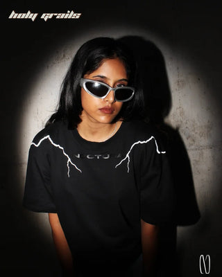 Girl in Streetwear Style 'Thunderstruck' Reflective Black 260 GSM 100% French Terry Cotton T-Shirt HG x Noctura - Front