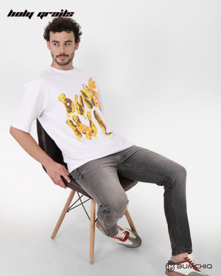 Guy in Streetwear Style 'Bee' White 240 GSM French Terry Cotton T-Shirt - Front Sitting on Chair