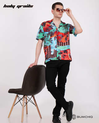 Guy in Streetwear Style 'Black Floral' Green Oversized Rayon Shirt - Front Holding Chair