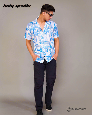 Guy in Streetwear Style 'Heritage Palm' White & Blue Cotton Shirt - Front with black shades