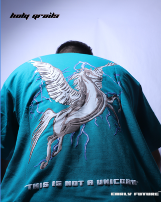 Guy in Streetwear Style 'Not A Unicorn' Reliance Green/Blue Oversized 240 Terry Cotton T-Shirt - Back