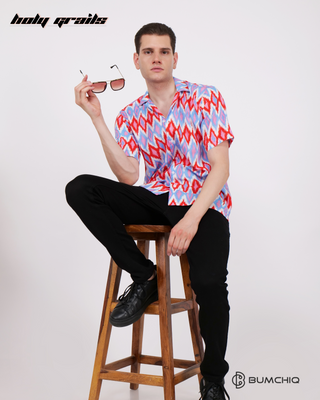 Guy in Streetwear Style 'Pochumpally Ikat' Multi-color Cotton Shirt - Front Sitting on Stool