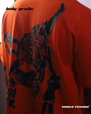 Guy in Streetwear Style 'T-Rex' Orange Oversized 230 GSM Terry Cotton T-Shirt - Back Close Up