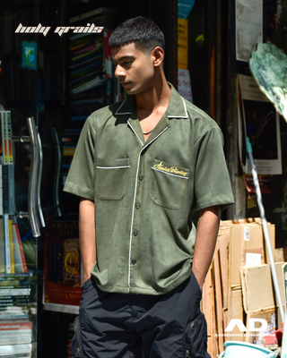 Guy in Streetwear Style 'Vintage Suede Seaweed Green' Oversized Vegan Suede Shirt - Front