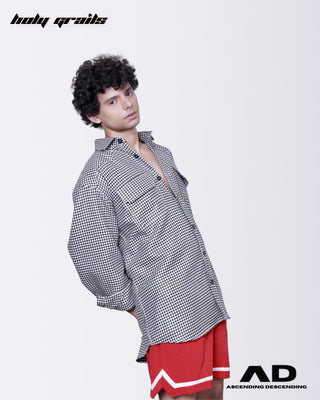 Guy wearing a Street Style 'Check-Mate' Black & White Full Sleeve Oversize Shirt and red shorts - Side 1