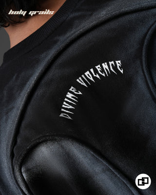 Guy in Street Style 'Divine Violence' Black Spray Painted 240 GSM 100% Cotton Oversize Tee - Back Print 1 Close Up