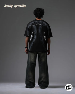Guy in Street Style 'Divine Violence' Black Spray Painted 240 GSM 100% Cotton Oversize Tee - Back Full