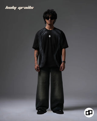 Guy in Street Style 'Divine Violence' Black Spray Painted 240 GSM 100% Cotton Oversize Tee - Front Full