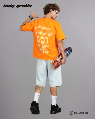 Guy in Street Style 'God's Got This' Orange 240 GSM 100% Terry Cotton Screen Printed Oversize Graphic Tee HG x Bumchiq - Back Full with Skateboard