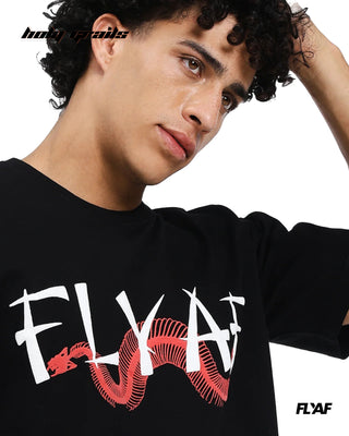 Guy in Street Style 'Money Over Emotions' Black 240 GSM 100% Cotton Puff Printed Oversize Tee HG x FLYAF - Front Close Up