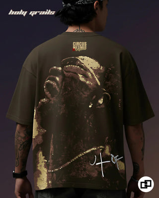 Guy in Street Style 'Travis Scott Circus Maximus' Olive Green 240  GSM 100% Cotton Graphic Puff and Screen Printed Oversized Tee - Back