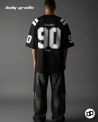 Guy in Street Style 'Varsity' Black 240 GSM 100% Cotton Puff Printed Oversize T-Shirt HG x Grey Hound - Back Full