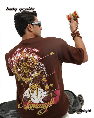 Guy Sitting in Street Style 'Veer Abhimanyu The Legacy of Valor' Brown 240 GSM French Terry Cotton Gold Wash Oversize Tee - Back