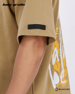 Guy in Streetwear Style 'Always Here' Beige 240 GSM 100% Terry Cottob Oversize Graphic T-Shirt HG x Bumchiq - Sleeve Close Up