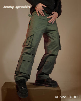 Guy in Streetwear Style 'Dk Green' 320 GSM 100% Cotton Baggy Cargo Pant HG x Against Odds - Front Side 1