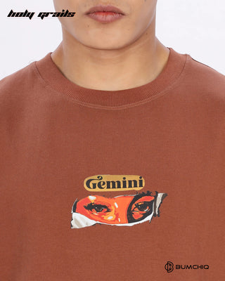 Guy in Streetwear Style 'FCK World' Brown 240 GSM 100% Terry Cotton Oversize Graphic T-Shirt HG x Bumchiq - Front Close Up