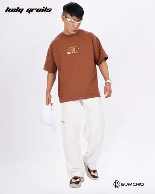 Guy in Streetwear Style 'FCK World' Brown 240 GSM 100% Terry Cotton Oversize Graphic T-Shirt HG x Bumchiq - Front Full