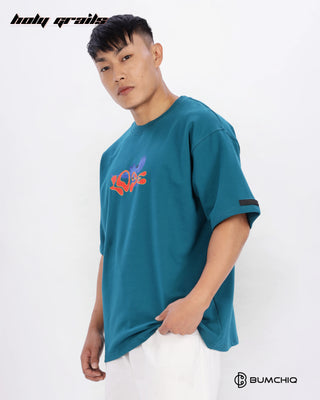 Guy in Streetwear Style 'Money Rules' Green 240 GSM 100% Terry Cotton Oversize Tee HG x Bumchiq - Side 1