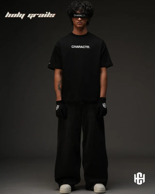 Men in 'It’s The God’s Will' Black 260 GSM 100% Terry Cotton Half Sleeve Oversize Graphic Tee HG x Charactr - Front Full