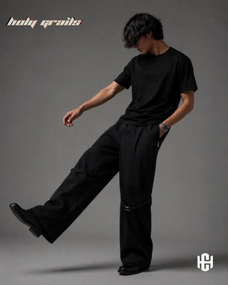 Men Standing in 'Anchor' Deep Black Premium Structured Denims Wide Leg Pants HG x Charactr - Front Side