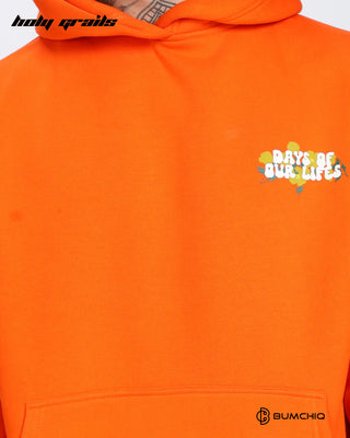 Men in Streetwear Style 'Day Life' Orange 350-370 GSM Puff Printed Oversize Graphic Hoodie HG x Bumchiq - Front Close Up