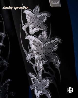 Men in 'Frosted Floral' Black Unisex 400 GSM Cotton Fleece Super Baggy Pants HG x Charactr - Front Side 1 Print Close Up