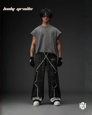 Men in 'Manushya Karam' Black Unisex 320 GSM 100% Cotton Fleece Digital Printed Baggy Pants HG x Charactr - Front Full