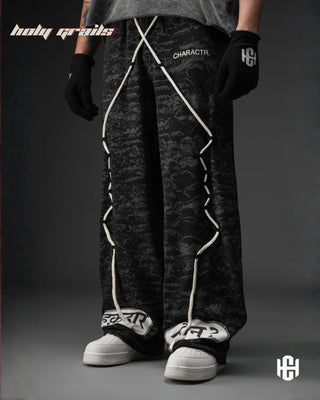 Men in 'Manushya Karam' Black Unisex 320 GSM 100% Cotton Fleece Digital Printed Baggy Pants HG x Charactr - Front Side 2