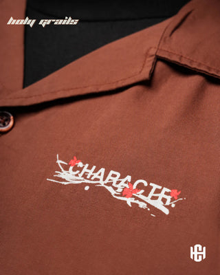 Men in 'Rooted Bowling' Earth Brown Cotton Twill Graphic Print Half Sleeve Shirt HG x Charactr - Front Close Up