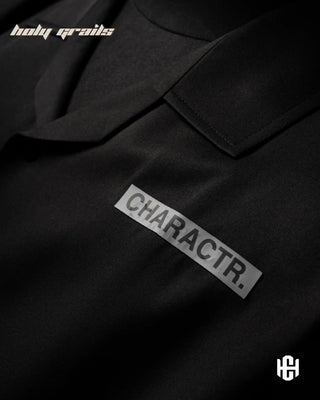 Men in 'The Dark Millionare' Black 280 GSM Banana Crepe Screen Printed Half Sleeve Shirt HG x Charactr - Front Close Up