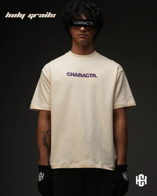 Men in 'The Fortune' Cream 240 GSM Terry Cotton Puff Print Graphic Oversize T-Shirt HG x Charactr - Front