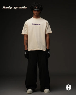 Men in 'The Fortune' Cream 240 GSM Terry Cotton Puff Print Graphic Oversize T-Shirt HG x Charactr - Front Full