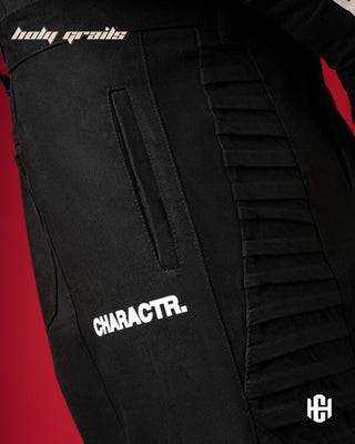 Men in 'Unisex Pleated' Black 320 GSM Premium Heavyweight Denim Baggy Pants HG x Charactr - Front Side 1 Close Up